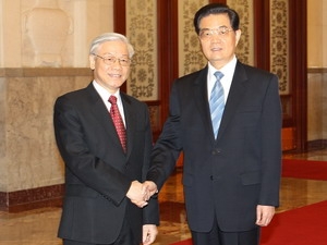 Tổng Bí thư, Chủ tịch nước Hồ Cẩm Đào đón Tổng Bí thư Nguyễn Phú Trọng. (Ảnh: Trí Dũng/TTXVN)