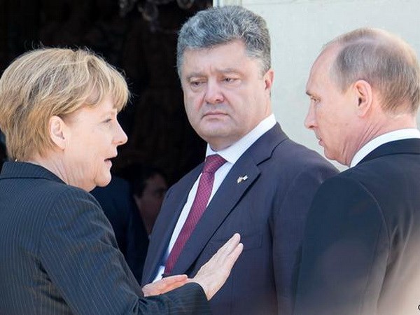Thủ tướng Đức Angela Merkel, Tổng thống Nga Vladimir Putin và Tổng thống Ukraine Petro Poroschenko.(Nguồn: Getty Images)