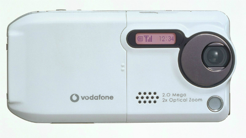 Sharp V602SH là điện thoại chứa ống kính zoom quang học đầu tiên ra đời vào tháng 6/2004.