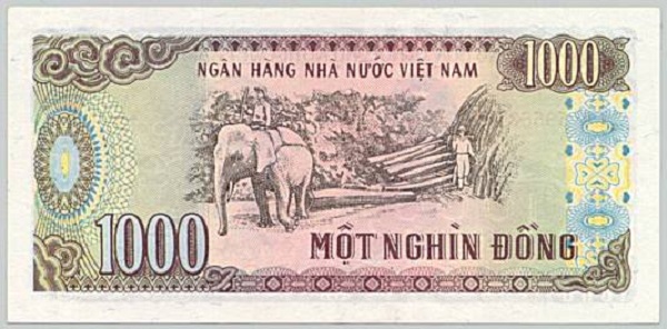 Trên tờ 1000 đồng là hình ảnh người lao động cưỡi voi khai thác gỗ tại Tây Nguyên