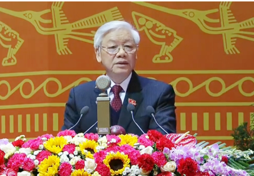Tổng Bí thư Nguyễn Phú Trọng trình bày báo cáo của BCH Trung ương Đảng khóa XI về các văn kiện Đại hội XII của Đảng