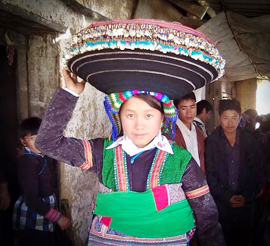 Impressive costume of a Mong girl