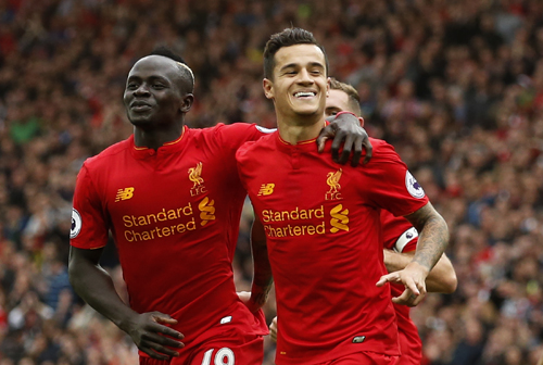 Sadio Mane và Coutinho cùng ghi những bàn thắng đẹp cho Liverpool. Ảnh: Reuters.