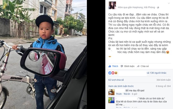 Sau khi xe đạp quẹt trúng ôtô, cậu bé 7 tuổi đã dừng lại, khoanh tay xin lỗi tài xế. Ảnh chụp màn hình.