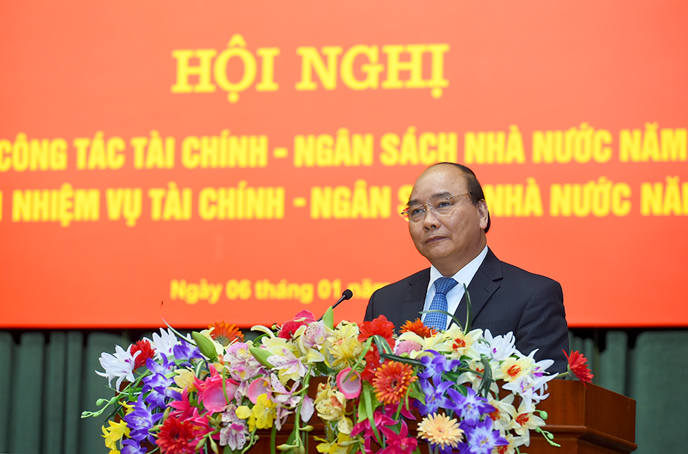 Thủ tướng Nguyễn Xuân Phúc phát biểu chỉ đạo tại Hội nghị đánh giá công tác thực hiện nhiệm vụ tài chính ngân sách năm 2016 và triển khai nhiệm vụ 2017 của Bộ Tài chính. Ảnh: VGP/Quang Hiếu