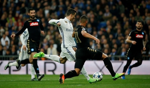  Không ghi bàn nhưng Ronaldo vẫn tạo dấu ấn đậm nét trong trận đấu với Napoli. Ảnh: Reuters.