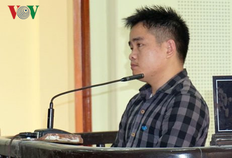 Bị cáo Nguyễn Văn Dinh tại phiên xét xử ngày 21/2.