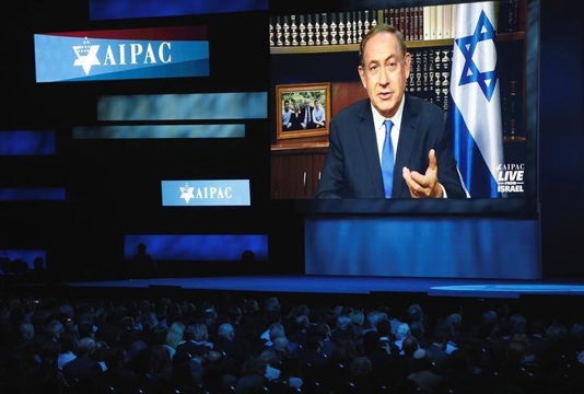 Thủ tướng Israel Benjamin Netanyahu phát biểu thông qua một liên kết video từ Israel. (Ảnh: Reuters) Font Size:    