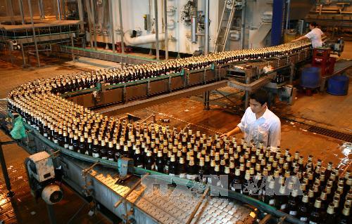 Dây chuyền sản xuất của Habeco tại nhà máy bia Hà Nội – Mê Linh. Ảnh: Huy Hùng/TTXVN