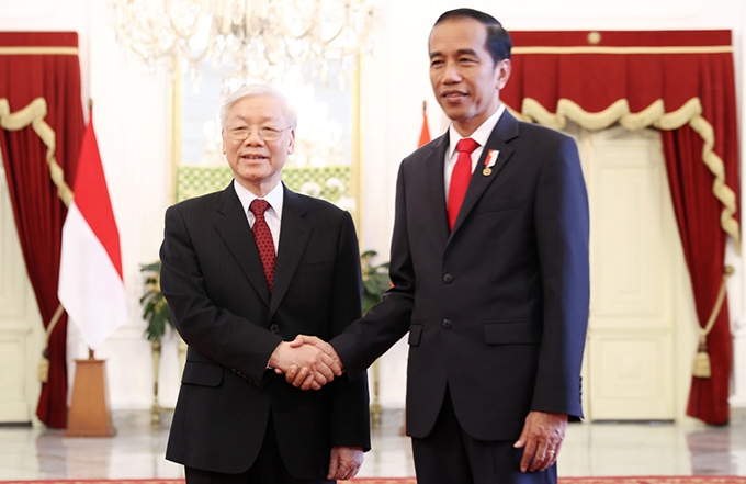 Tổng Bí thư Nguyễn Phú Trọng và Tổng thống Indonesia Joko Widodo. Ảnh: Trí Dũng – TTXVN