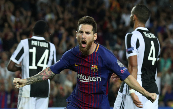  Niềm vui của Messi sau khi mở tỉ số cho Barca. Ảnh: REUTERS