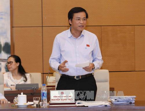 Tổng Thư ký Quốc hội Nguyễn Hạnh Phúc phát biểu ý kiến. Ảnh: Phương Hoa/TTXVN