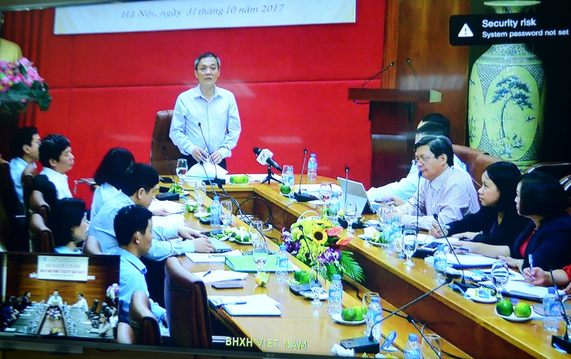 Phó Tổng Giám đốc BHXH Việt Nam Phạm Lương Sơn phát biểu tại hội nghị trực tuyến tại điểm cầu Hà Nội.