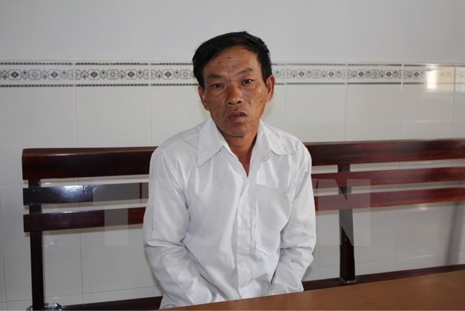 Đối tượng Nguyễn Văn Dự bị bắt tại cơ quan điều tra. (Ảnh: Thanh Sang/TTXVN)