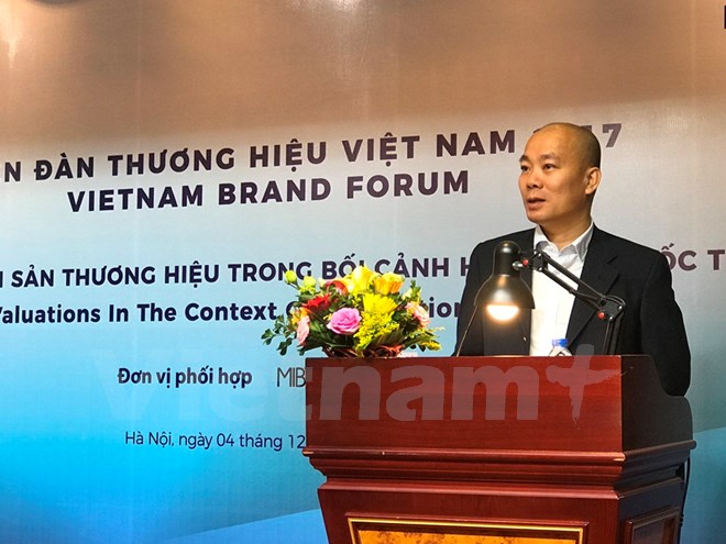 Lãnh đạo Cục Xúc tiến thương mại phát biểu tại hội thảo Định giá tài sản thương hiệu. (Ảnh: Đức Duy/Vietnam+)