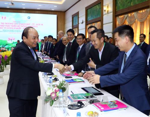 Thủ tướng Nguyễn Xuân Phúc và các đại biểu tham dự Diễn đàn. Ảnh: Thống Nhất/TTXVN