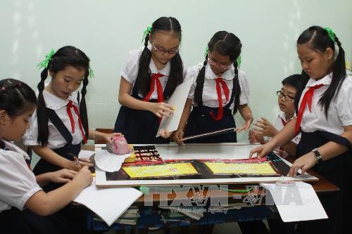Một tiết học tại Trường Tiểu học Nguyễn Hữu Cảnh (Quận 5, TP Hồ Chí Minh). Ảnh: Phương Vy/TTXVN