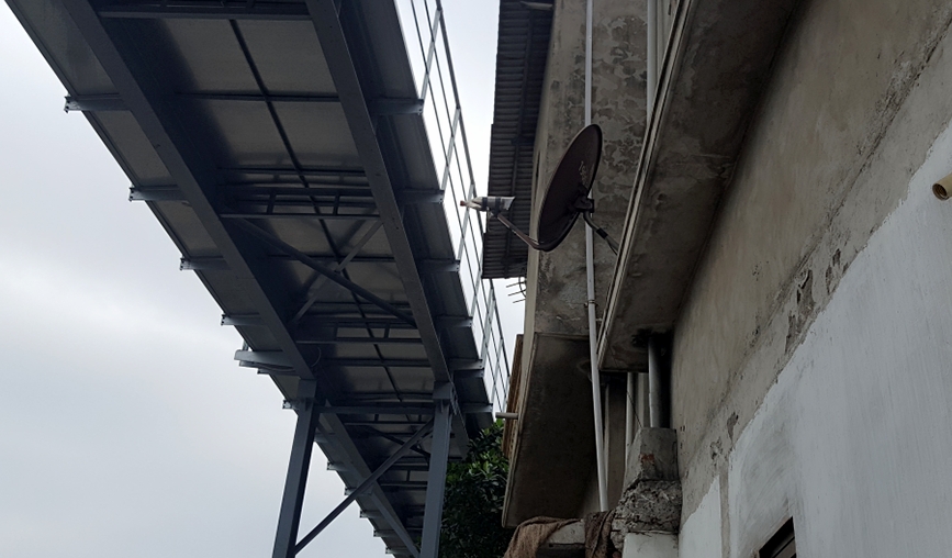 Nhà ở người dân thôn 1 xã Điền Công khá sát với tuyến băng tải, bị ảnh hưởng về tiếng ồn và lượng bụi