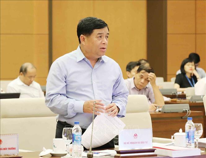 Bộ trưởng Bộ Kế hoạch và Đầu tư Nguyễn Chí Dũng phát biểu ý kiến. Ảnh: Phương Hoa/TTXVN