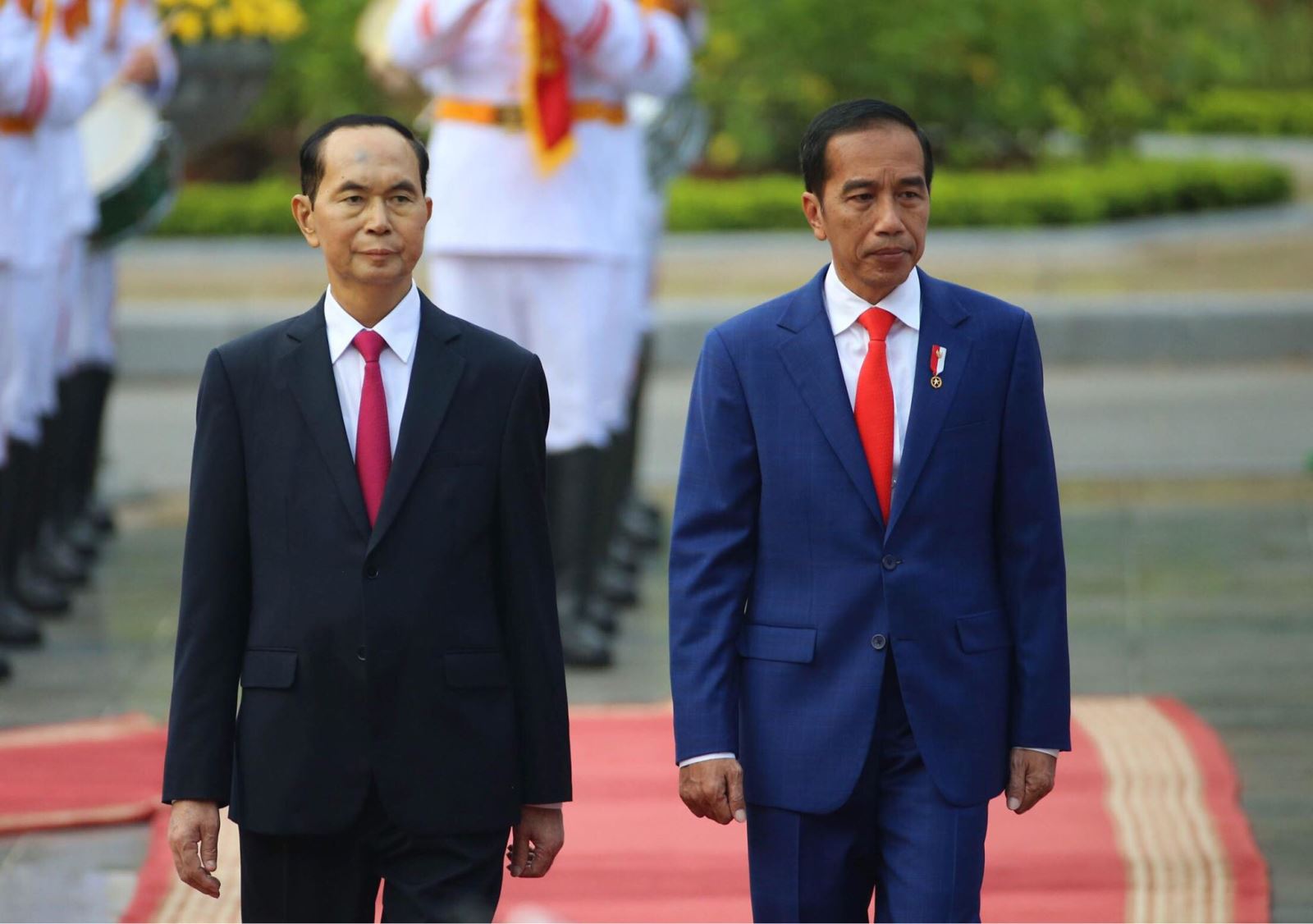 Chủ tịch nước Trần Đại Quang đón Tổng thống Indonesia Joko Widodo và Phu nhân thăm cấp Nhà nước ngày 11/9. Ảnh: TTXVN
