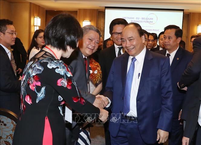 Thủ tướng Nguyễn Xuân Phúc và các đại biểu tham dự diễn đàn. Ảnh: Thống Nhất/TTXVN