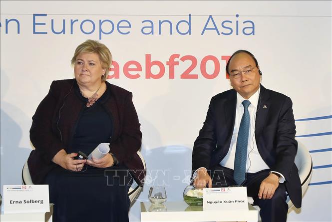 Thủ tướng Nguyễn Xuân Phúc và Thủ tướng Na Uy Erna Solberg - hai lãnh đạo cấp cao của ASEM được mời gặp gỡ và đối thoại với các doanh nghiệp Á Âu trong khuôn khổ Diễn đàn Doanh nghiệp Á Âu lần thứ 16. Ảnh: Thống Nhất/TTXVN