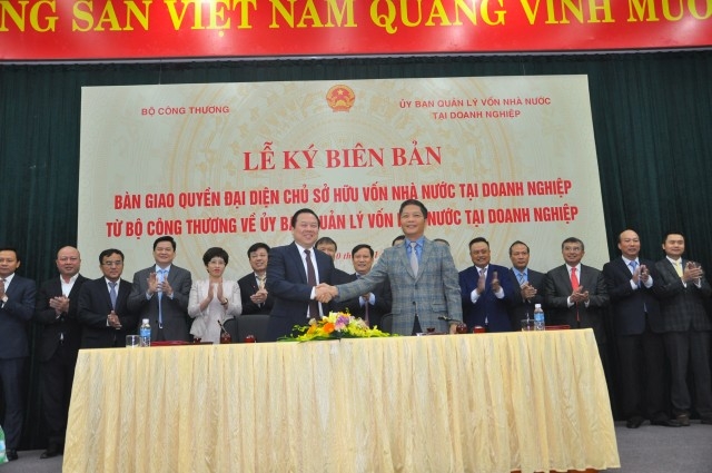 Bộ trưởng Công thương Trần Tuấn Anh và Chủ tịch Ủy ban Quản lý vốn nhà nước tại doanh nghiệp Nguyễn Hoàng Anh tại buổi lễ.