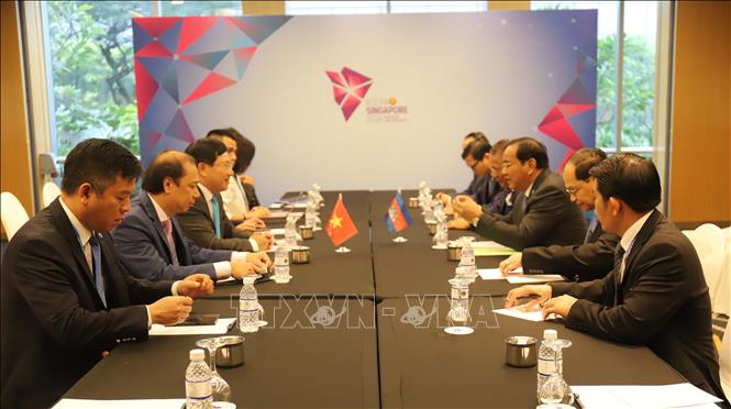 Phó Thủ tướng, Bộ trưởng Ngoại giao Phạm Bình Minh gặp Bộ trưởng Ngoại giao Campuchia. Ảnh: Xuân Vịnh
