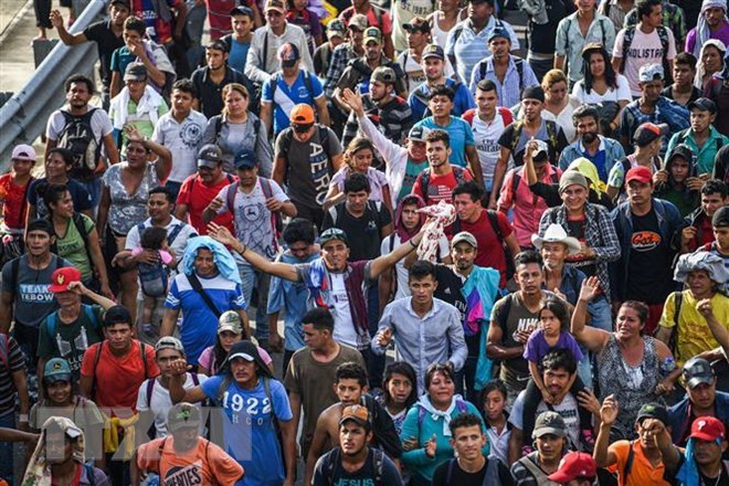 Người di cư Honduras tại tuyến đường nối Ciudad Hidalgo và Tapachula, bang Chiapas, Mexico trong hành trình tới Mỹ ngày 21/10/2018. 