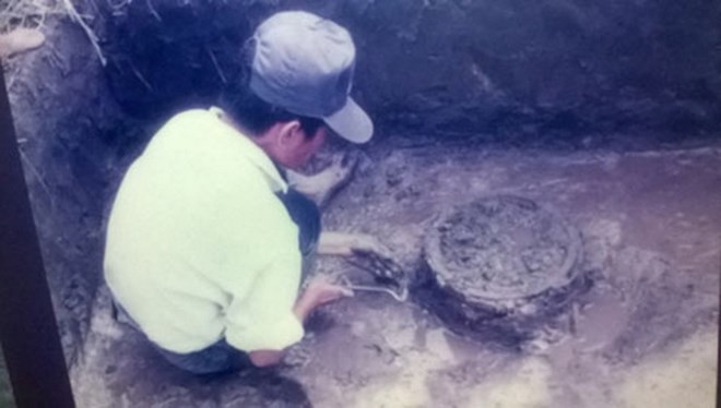 Mộ chum gỗ được phát hiện tại di tích khảo cổ Phú Chánh. (Nguồn: baobinhduong.vn)