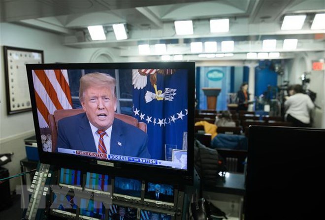 Bài phát biểu của Tổng thống Mỹ Donald Trump tại Nhà Trắng được truyền hình trực tiếp trên toàn quốc ngày 8/1/2019. (Ảnh: AFP/TTXVN)