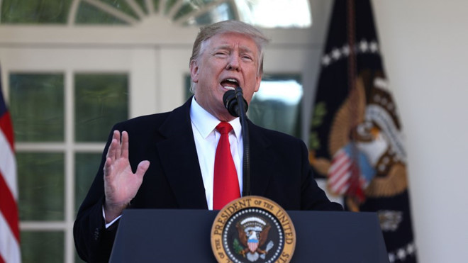 Tổng thống Trump tuyên bố chấp nhận tạm thời mở cửa chính phủ Mỹ. Ảnh: AFP.