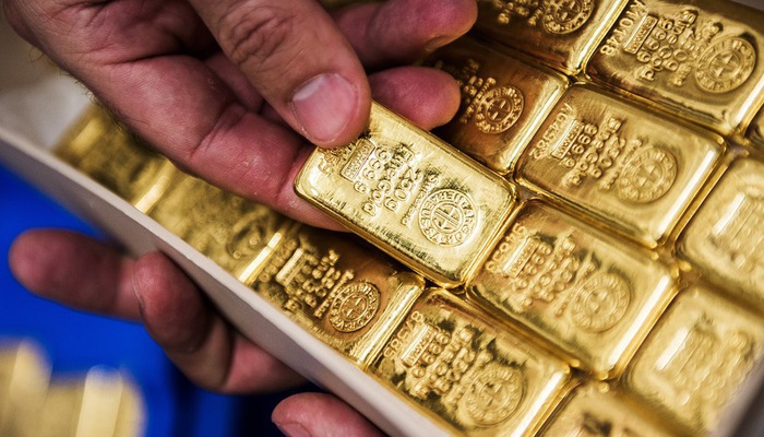 Giá vàng thế giới đã vượt được ngưỡng cản 1.300 USD/oz - Ảnh: Bloomberg.