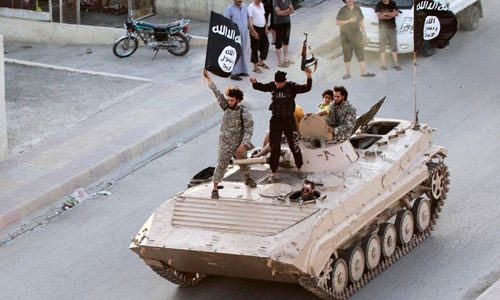 Chiến binh IS ở Raqqa tháng 6/2014. Ảnh: Reuters.