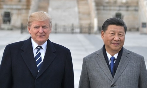Tổng thống Trump (trái) và Chủ tịch Tập tại Bắc Kinh hồi tháng 11/2017. Ảnh: AFP.