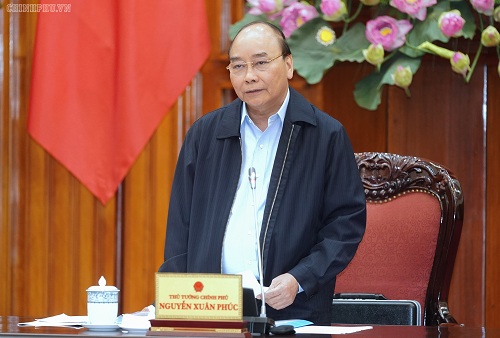 Thủ tướng Nguyễn Xuân Phúc phát biểu tại cuộc họp - Ảnh: VGP/Quang Hiếu