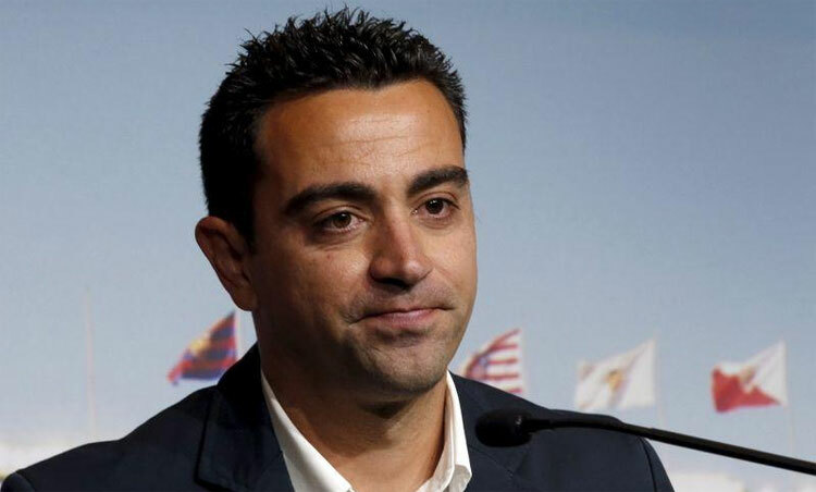 Xavi chỉ trở lại từ hè tới, nếu Barca đồng ý. Ảnh: Reuters