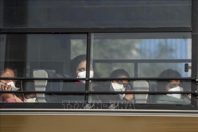Xe chở công dân Ấn Độ từ thành phố Vũ Hán, Trung Quốc, trở về New Delhi, ngày 1/2/2020. Ảnh minh họa: AFP/TTXVN