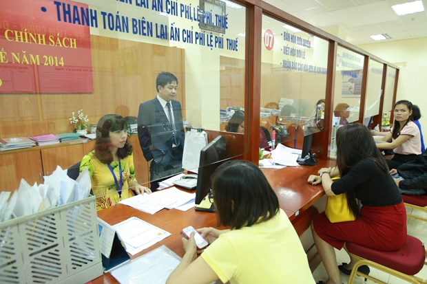 Hoạt động nghiệp vụ tại chi cục thuế quận Bắc Từ Liêm, Hà Nội. (Ảnh: Hoàng Tùng/TTXVN)