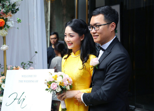 BTV Thu Hà và chồng.