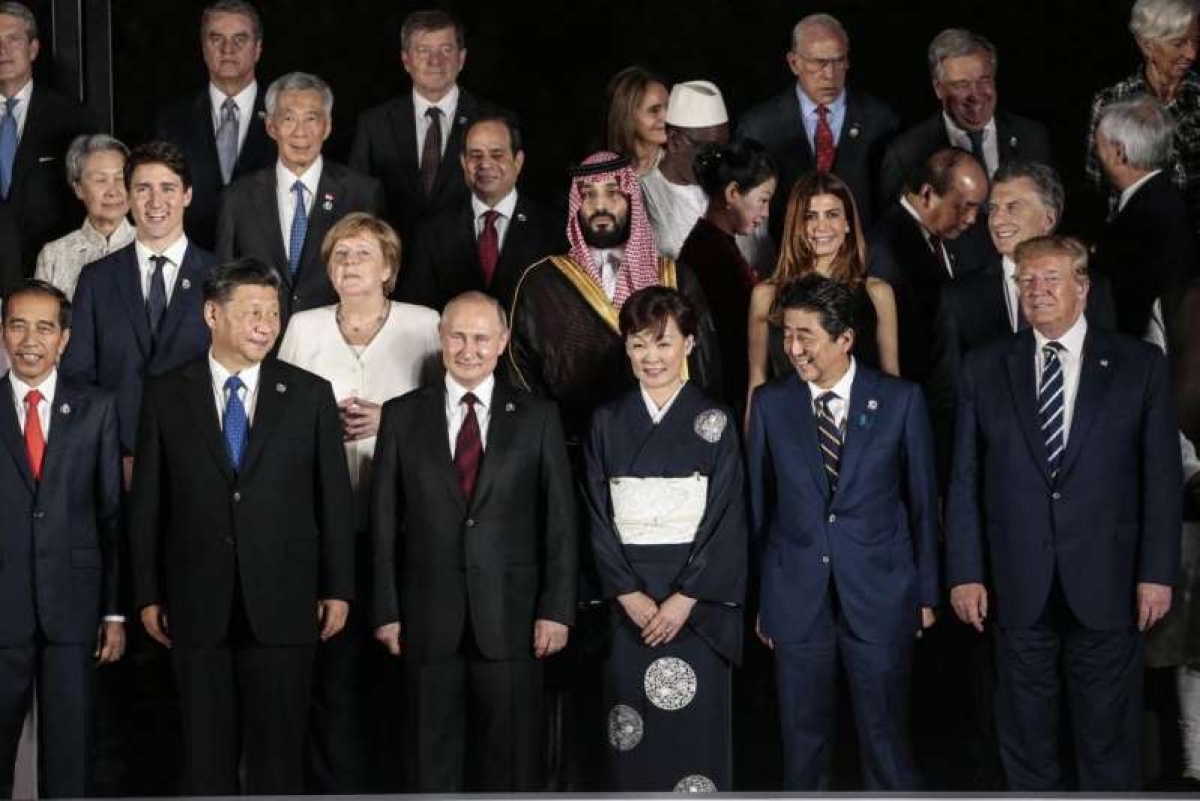 Tổng thống Mỹ Donald Trump, Thủ tướng Nga Vladimir Putin, Chủ tịch Trung Quốc Tập Cận Bình, Thủ tướng Đức Angela Merkel, cựu Thủ tướng Nhật Bản Shinzo Abe và các nhà lãnh đạo thế giới trong bức ảnh tập thể tại Hội nghị Thượng đỉnh G20 năm 2019 ở Osaka, Nhật Bản. Ảnh: Getty