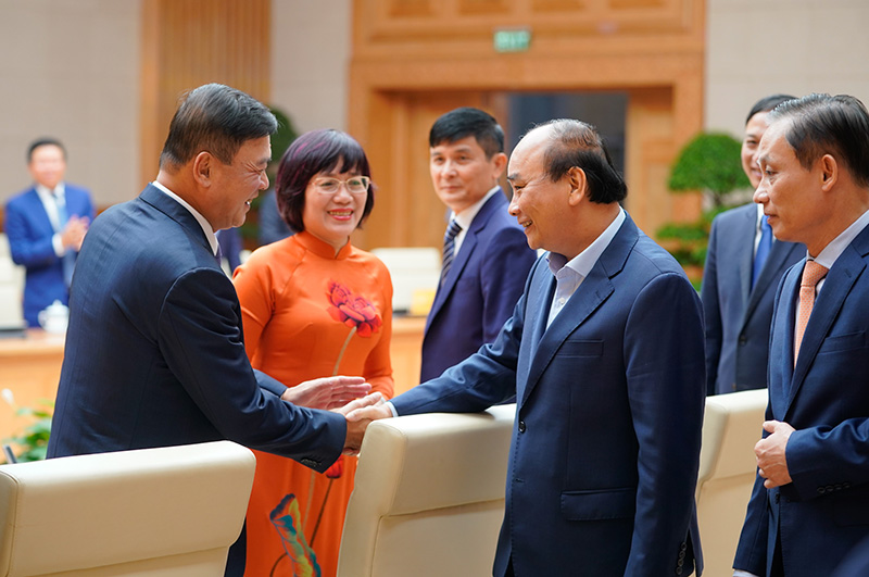 Thủ tướng Nguyễn Xuân Phúc và các đại biểu dự buổi gặp mặt. - Ảnh: VGP/Quang Hiếu