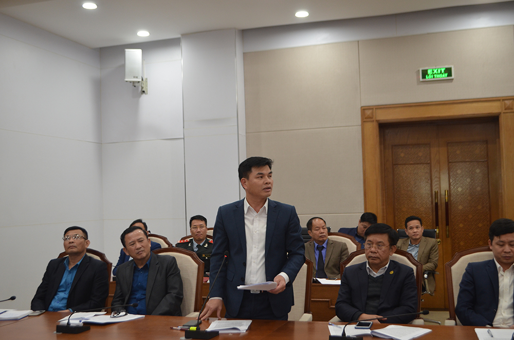 Đại diện UBND TP Uông Bí trình bày tham luận tại hội nghị.
