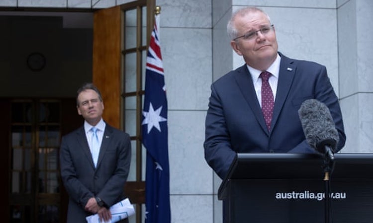 Ông Scott Morrison, Thủ tướng Australia, cho biết nước này không vội vàng tiêm vaccine COVID-19 cho người dân. Ảnh: The Guardian