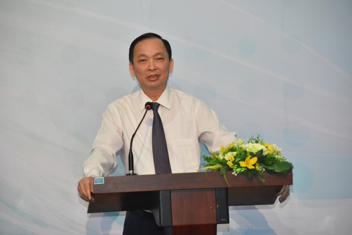 Phó thống đốc Ngân hàng Nhà nước Đào Minh Tú phát biểu sáng 20/1. Ảnh: NLĐ.
