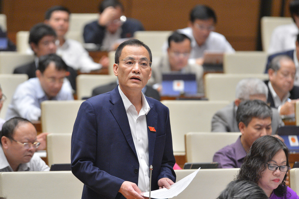 Đại biểu Trần Văn Minh - Đoàn ĐBQH tỉnh Quảng Ninh, phát biểu tại phiên thảo luận tại Kỳ họp thứ 10, Quốc hội Khóa XIV (tháng 11/2020).