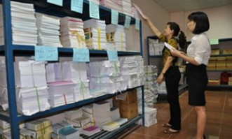 Quy định về chuyển xếp lương chức danh viên chức lưu trữ