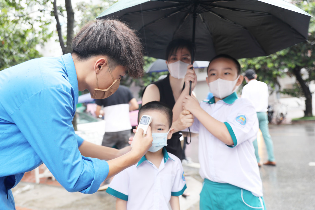 All of the teachers, students and guests wore face masks, had their temperature checked and washed their hands with sanitizer.