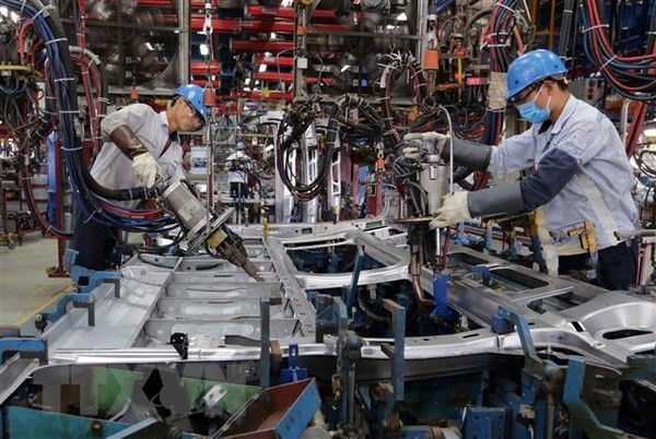 A plant in Việt Nam. The Vietnamese economy will remain stable and be driven by industrialisation and urbanisation in the medium term.