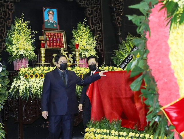 Prime Minister Phạm Minh Chính paid tribute to General Phùng Quang Thanh at the State funeral held yesterday. 